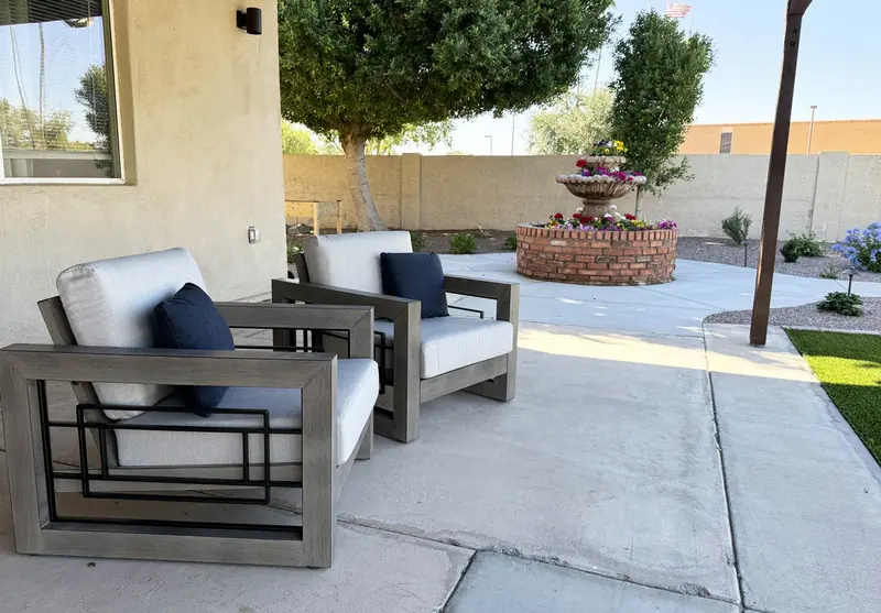 Patio chairs by the fountain